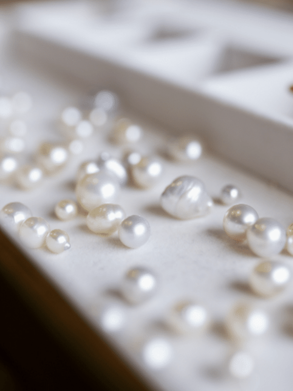 Akoya vs South Sea Pearls An assortment of Australian pearls, grown at both our Cygnet Bay and Broken Bay pearl farm, sit of a tray ready to be inspected during a Pearl grading experience available at Cygnet Bay Pearl Farm.