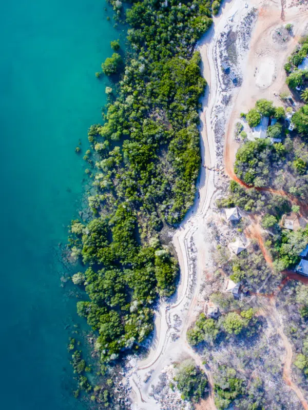 Several accommodation sites sit nestled between native Australian shrubs and trees and a few steps away from the turqouise waters of Cygnet Bay.