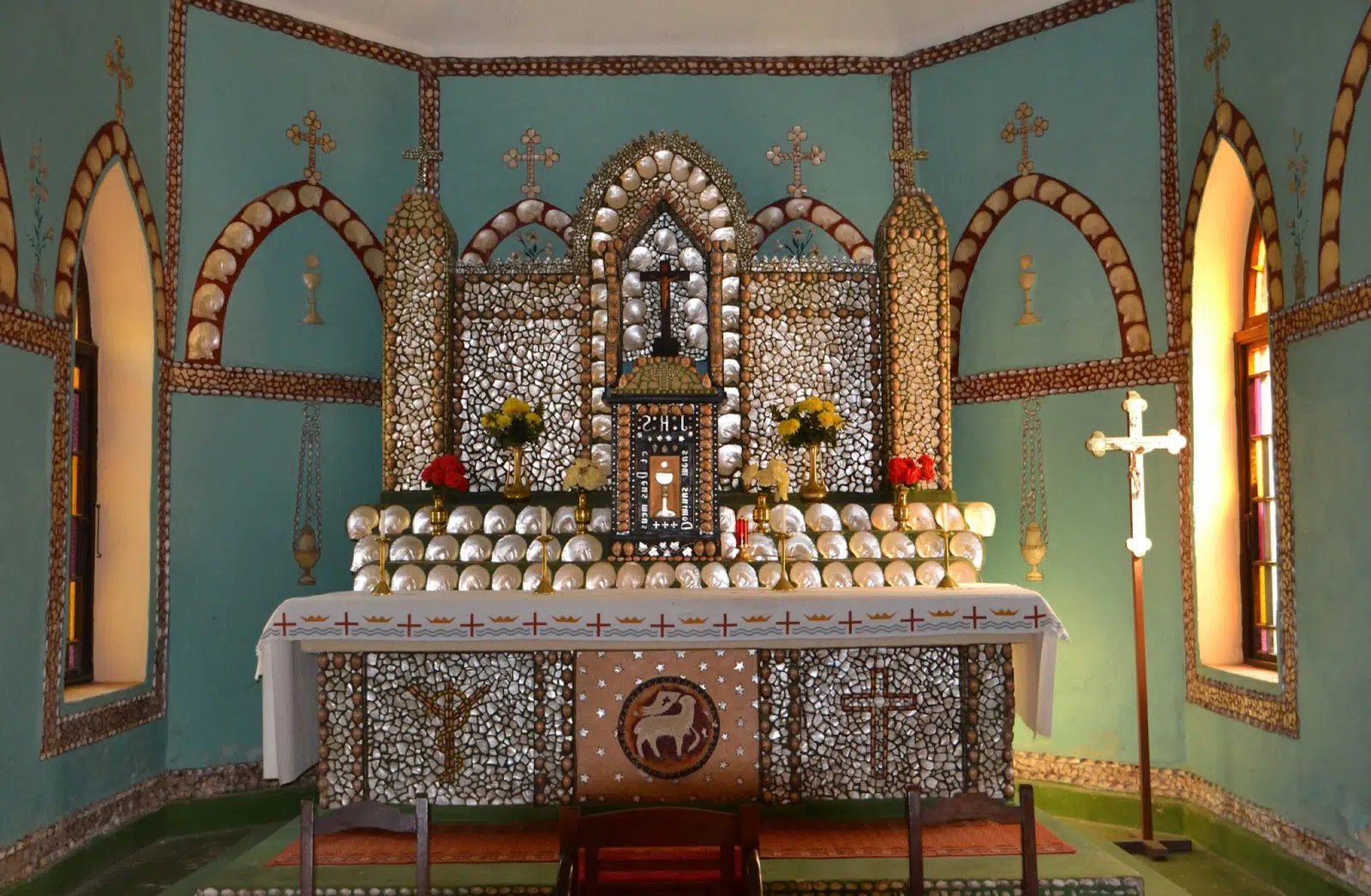 The beautiful interior of Beagle Bay Church, also known as the Mother of Pearl Church, is a sight to behold. With multiple alters comrpised of Mother of Pearl shell around the church, as well as decorating the trimmings of walls, arches resembling the windows on the ways - visiting this unique church is a must as a traveller to Cygnet Bay Pearl Farm or the Beagle Bay community.