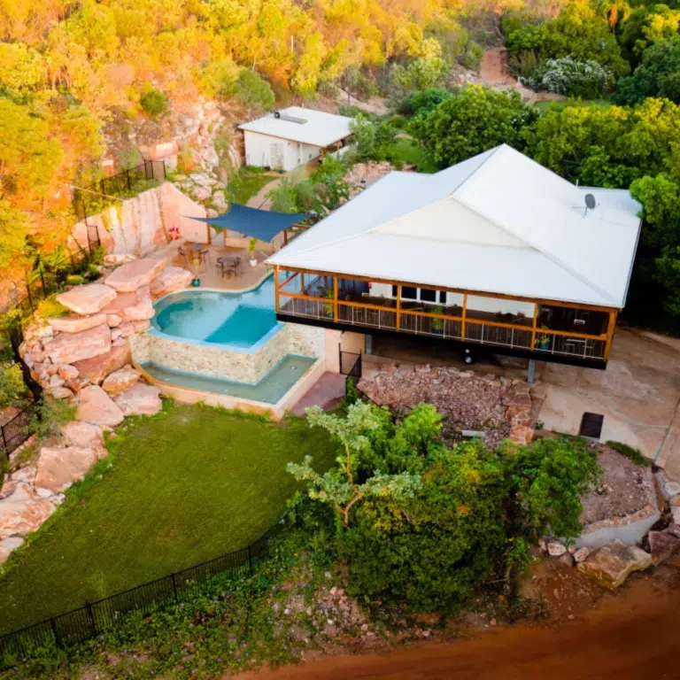 An aerial view of the Homestead restaurant and infinity pool, surrounded by the beautiful landscape of Cygnet Bay. The Restaurant faces the panoramic views of the Kimberley coastline.